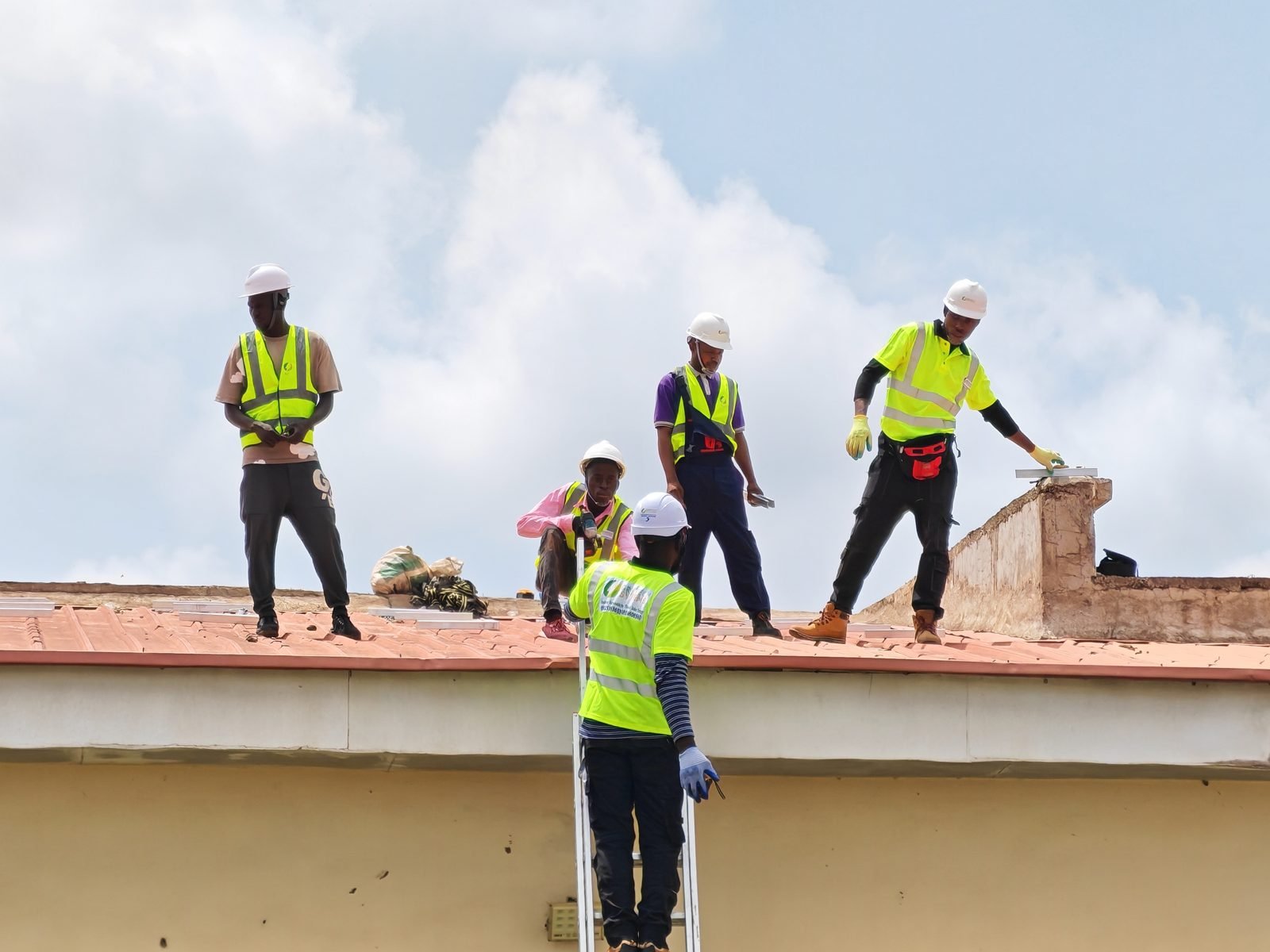 Installation team on a rooftop